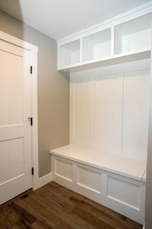 mudroom with dark wood-type flooring