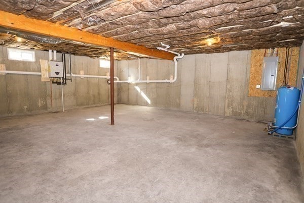 basement with electric panel