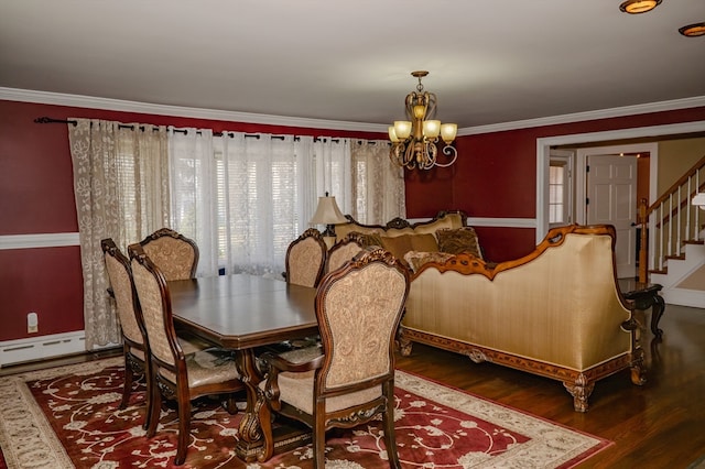 dining area featuring a chandelier, dark hardwood / wood-style floors, and ornamental molding