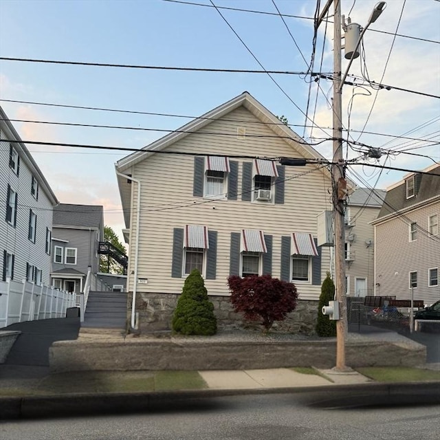 808 Walnut St, Fall River, MA 02720 - view of front of home with cooling unit and fence