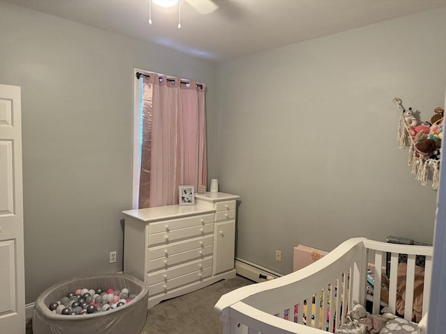808 Walnut St, Fall River, MA 02720 - bedroom featuring a ceiling fan, a nursery area, baseboard heating, and carpet floors