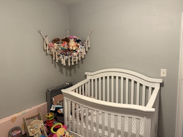 808 Walnut St, Fall River, MA 02720 - bedroom featuring a crib