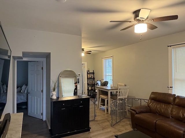 808 Walnut St, Fall River, MA 02720 - living room featuring a ceiling fan and wood finished floors