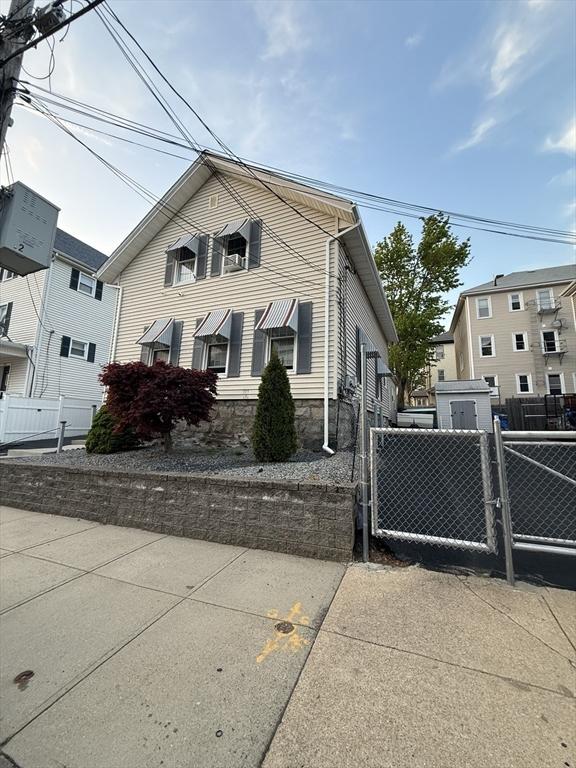 808 Walnut St, Fall River, MA 02720 - view of front of property featuring fence and a gate