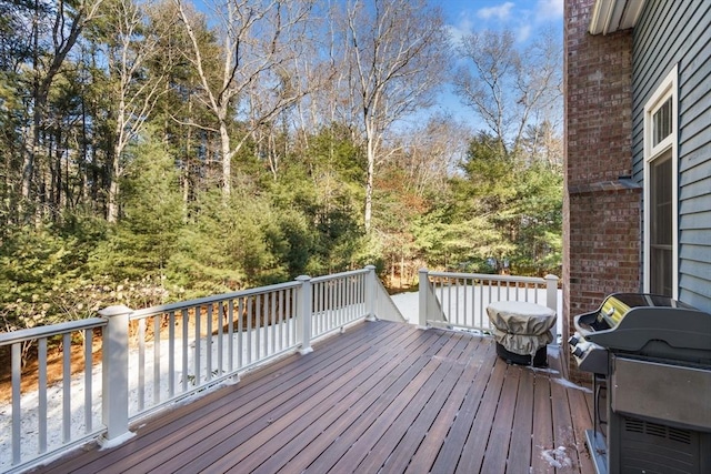 wooden deck with area for grilling