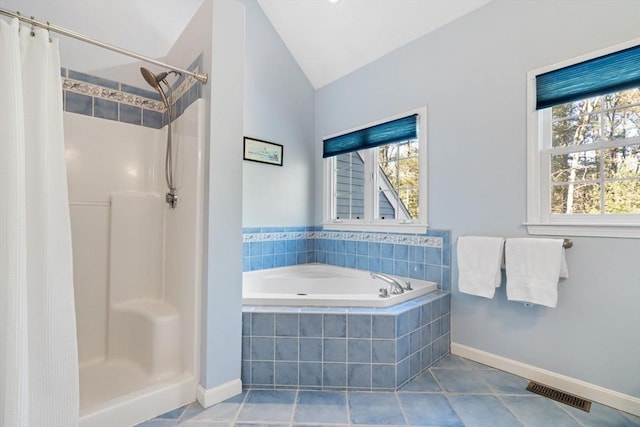 full bath with visible vents, plenty of natural light, and a stall shower