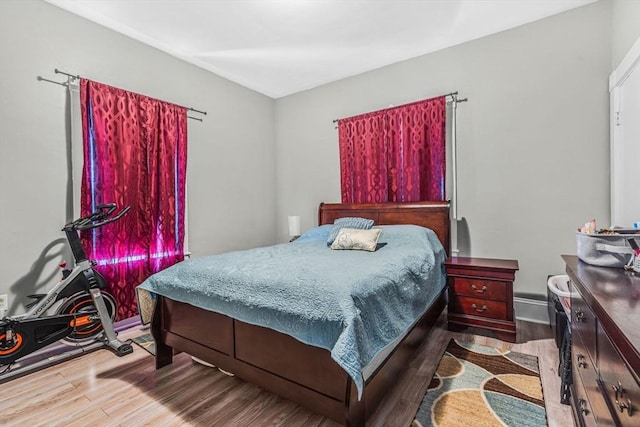bedroom featuring wood finished floors