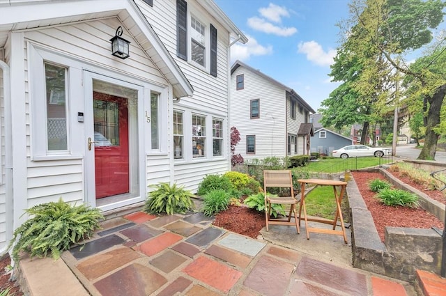 doorway to property with a patio
