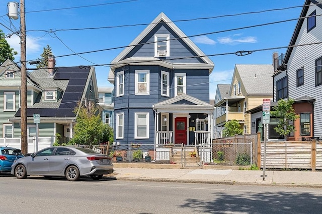 115 Elm St, Somerville, MA 02144 - view of front of home with a fenced front yard