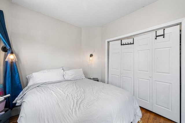 115 Elm St, Somerville, MA 02144 - bedroom featuring wood finished floors and a closet