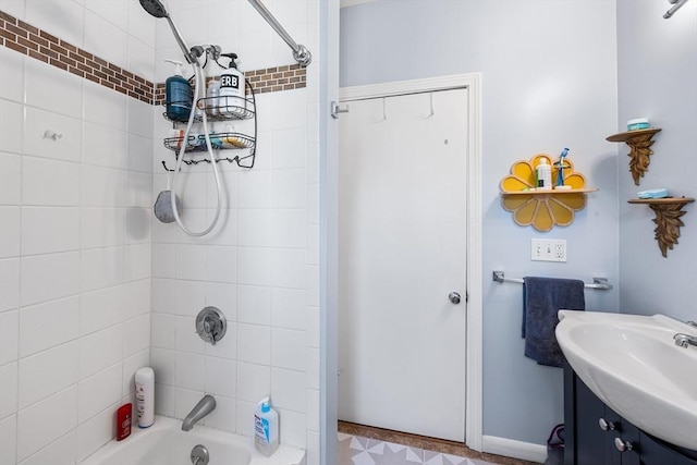 115 Elm St, Somerville, MA 02144 - bathroom featuring  shower combination, baseboards, and vanity