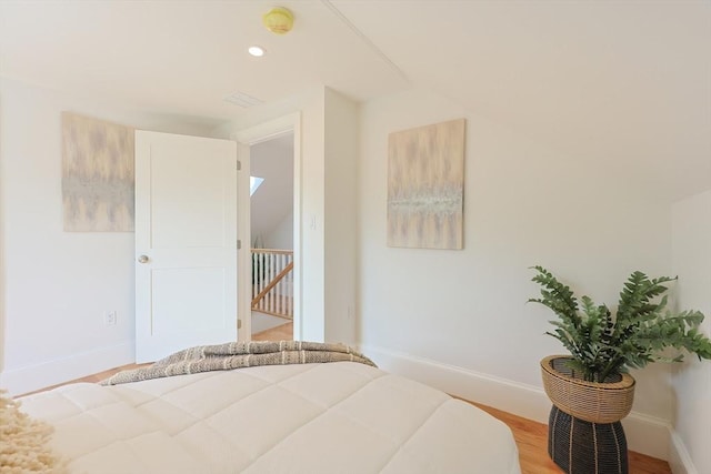 179 Main Unit 2, Medford, MA 02155 - bedroom with light wood-style floors, baseboards, and recessed lighting