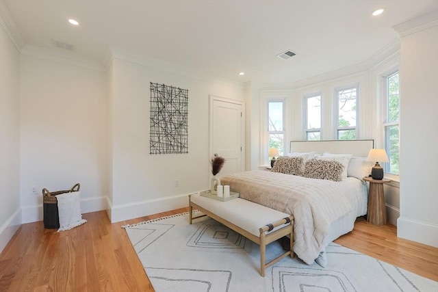 179 Main Unit 2, Medford, MA 02155 - bedroom featuring ornamental molding, baseboards, light wood-style floors, and recessed lighting