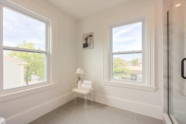 179 Main Unit 2, Medford, MA 02155 - full bathroom with a stall shower, baseboards, and tile patterned flooring
