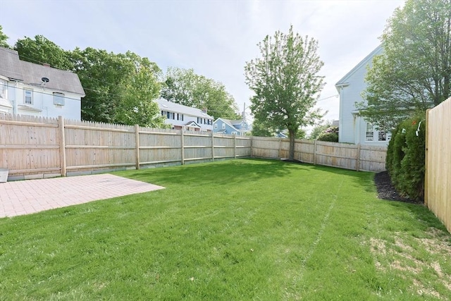 179 Main Unit 2, Medford, MA 02155 - view of yard featuring a patio