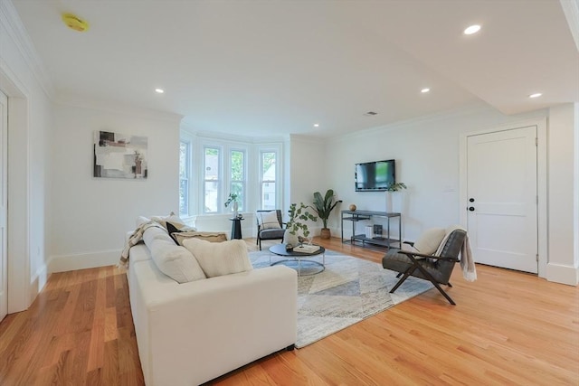 179 Main Unit 2, Medford, MA 02155 - living area featuring ornamental molding, baseboards, light wood-style floors, and recessed lighting