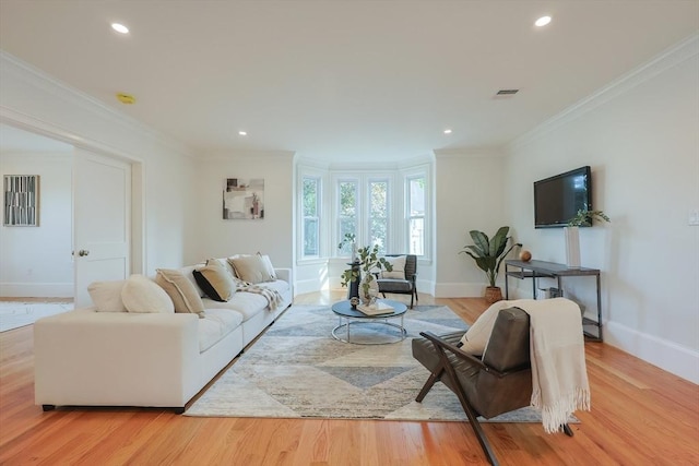 179 Main Unit 2, Medford, MA 02155 - living area featuring crown molding, baseboards, recessed lighting, and light wood finished floors