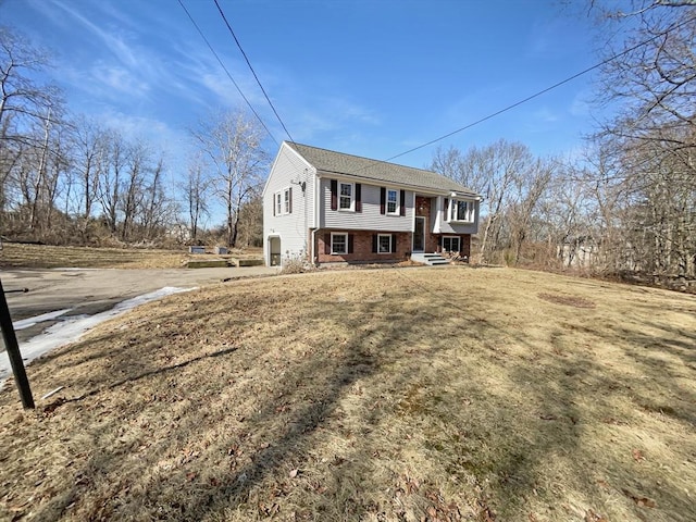 raised ranch with brick siding