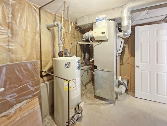 utility room with water heater