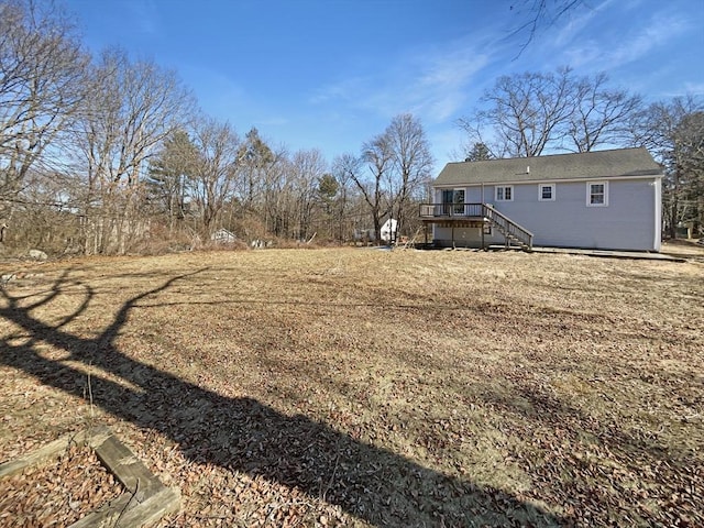 view of yard featuring a wooden deck