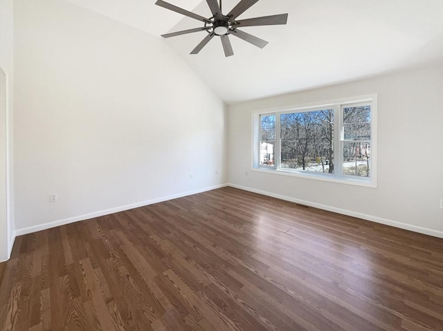 empty room with a ceiling fan, dark wood-style floors, baseboards, and high vaulted ceiling