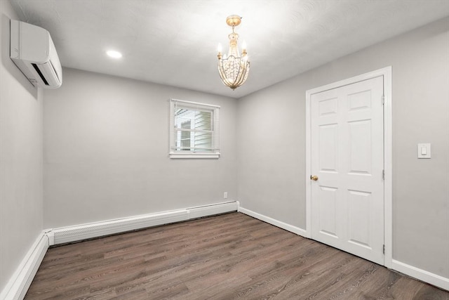 13 Campello Rd, Framingham, MA 01701 - unfurnished room with a wall unit AC, a chandelier, wood finished floors, baseboards, and recessed lighting