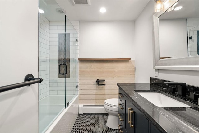 13 Campello Rd, Framingham, MA 01701 - bathroom with baseboard heating, toilet, vanity, combined bath / shower with glass door, and recessed lighting
