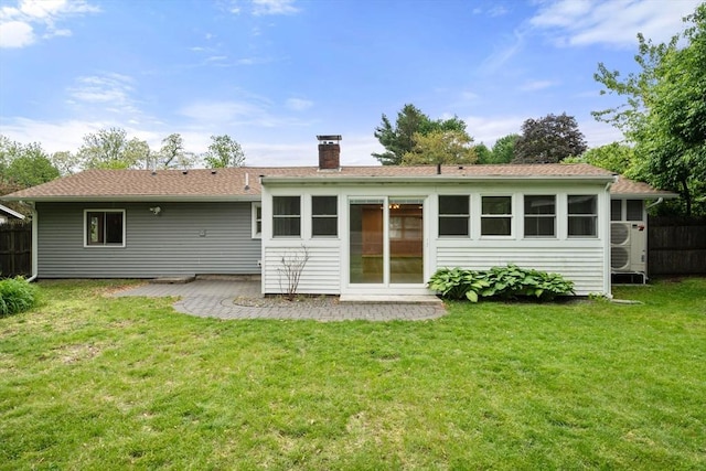 13 Campello Rd, Framingham, MA 01701 - back of property with a chimney and a patio area
