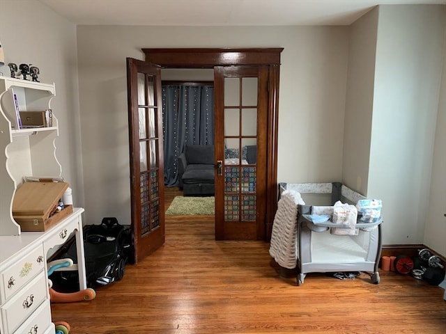 hall with wood finished floors