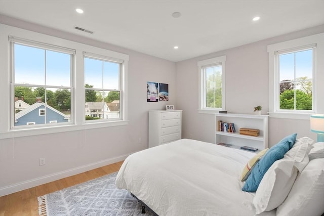 68 Summer St Unit B, Natick, MA 01760 - bedroom featuring multiple windows, light wood-style floors, baseboards, and recessed lighting