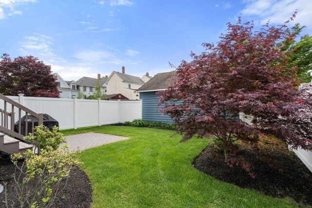 68 Summer St Unit B, Natick, MA 01760 - view of yard featuring a patio area and a residential view