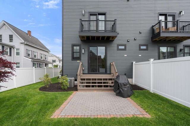 68 Summer St Unit B, Natick, MA 01760 - rear view of house with a balcony, a patio area, and central AC
