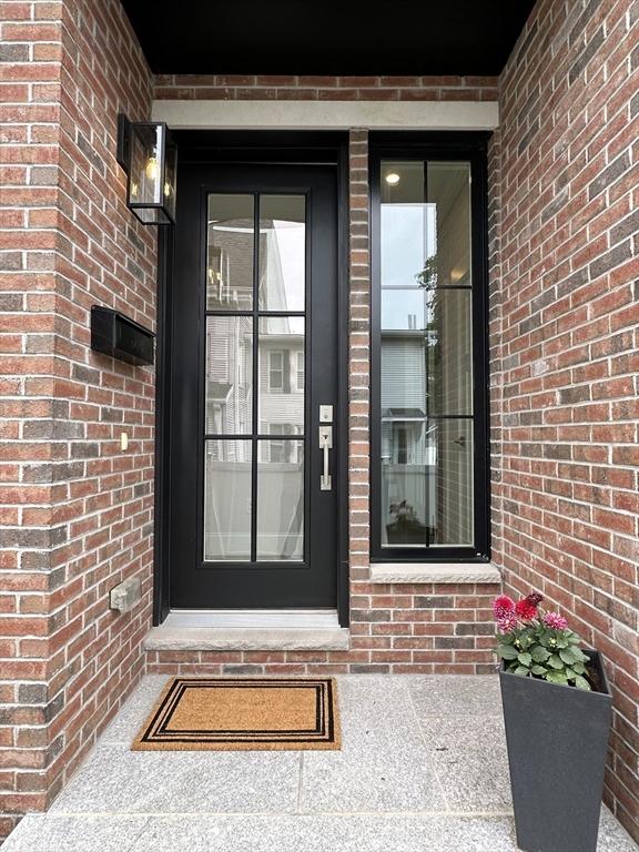 68 Summer St Unit B, Natick, MA 01760 - property entrance featuring brick siding
