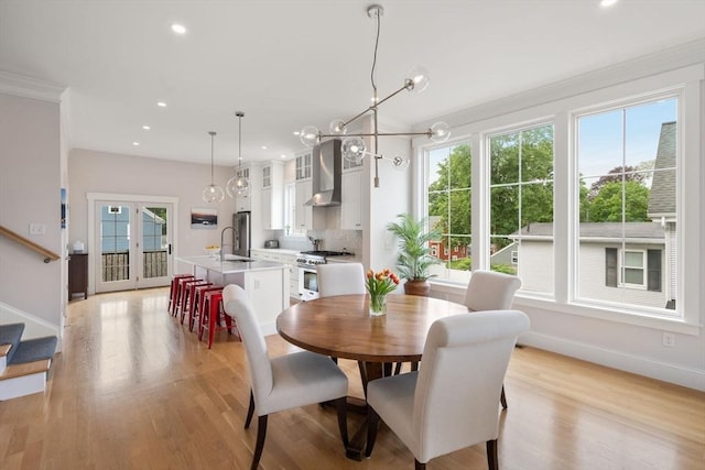 68 Summer St Unit B, Natick, MA 01760 - dining space with crown molding, baseboards, light wood-style floors, recessed lighting, and stairway