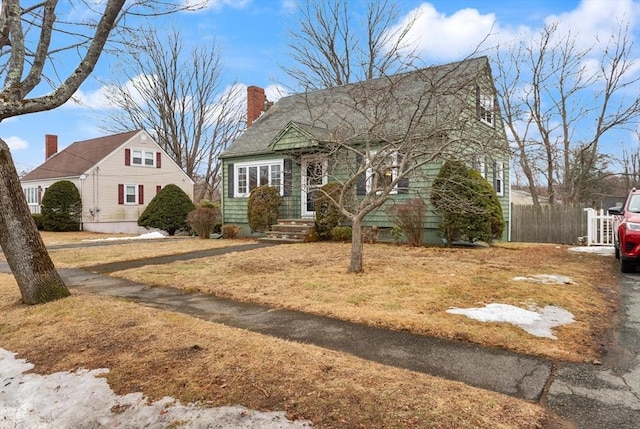 view of front of house with a chimney