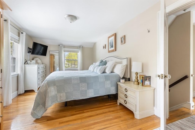 118 Academy Ave, Weymouth, MA 02188 - bedroom with light wood-style flooring and baseboards