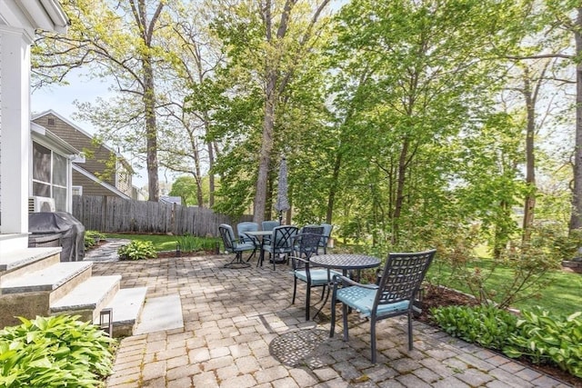 118 Academy Ave, Weymouth, MA 02188 - fenced backyard featuring outdoor dining space, a patio, and grilling area