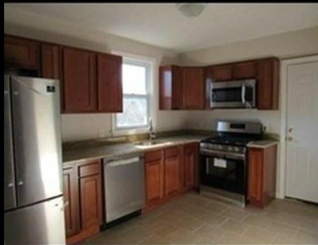 kitchen featuring sink and appliances with stainless steel finishes