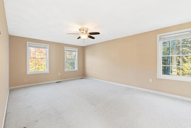 29 Winston Cir, Haverhill, MA 01830 - carpeted empty room with a ceiling fan and healthy amount of natural light