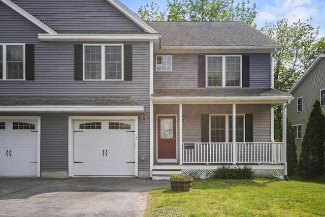 41 Belmont Ave Unit 41, Haverhill, MA 01830 - view of front of home with covered porch, a garage, a front yard, a shingled roof, and asphalt driveway