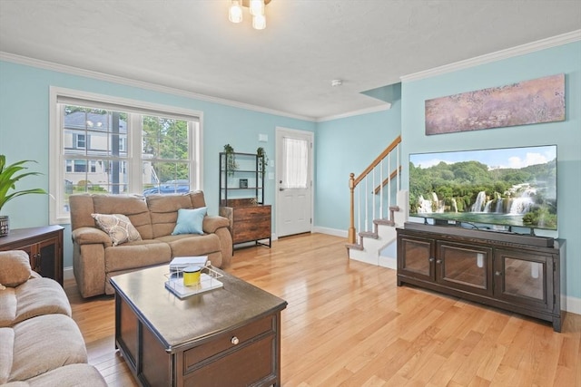 41 Belmont Ave Unit 41, Haverhill, MA 01830 - living room with light wood-type flooring, crown molding, stairway, and baseboards