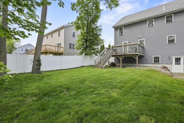 41 Belmont Ave Unit 41, Haverhill, MA 01830 - back of property featuring a wooden deck and stairway