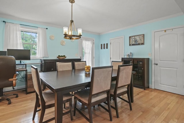 41 Belmont Ave Unit 41, Haverhill, MA 01830 - dining space featuring light wood-style flooring, a chandelier, and ornamental molding