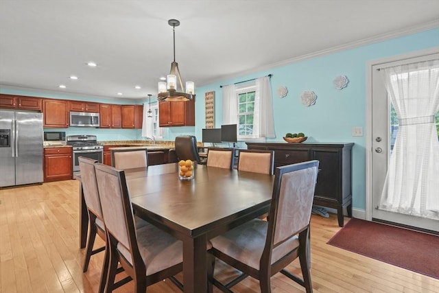 41 Belmont Ave Unit 41, Haverhill, MA 01830 - dining space with ornamental molding, light wood-style floors, recessed lighting, and a chandelier