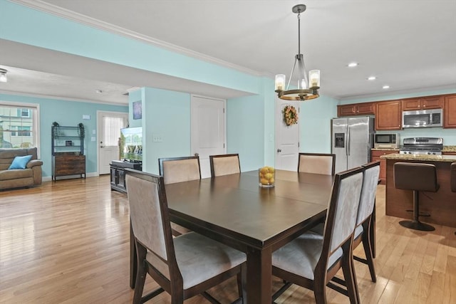 41 Belmont Ave Unit 41, Haverhill, MA 01830 - dining room featuring ornamental molding, light wood-style flooring, recessed lighting, a chandelier, and baseboards