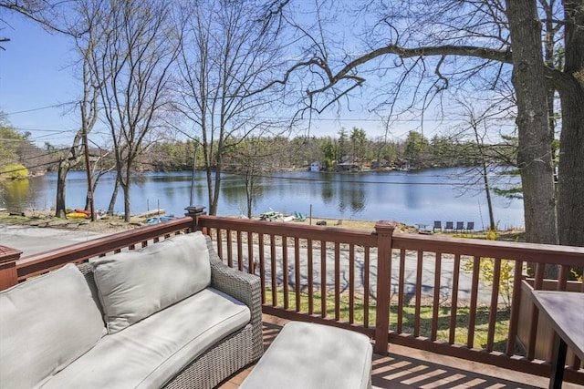 wooden terrace with a water view