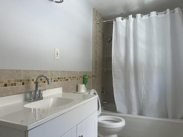 full bathroom featuring shower / tub combo, vanity, and toilet