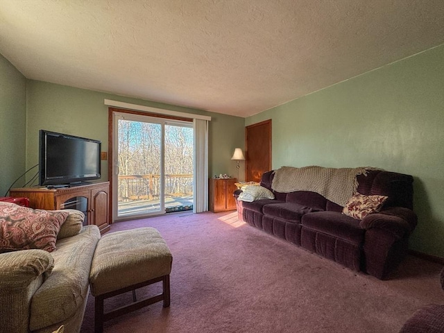 living room featuring a textured ceiling and light carpet