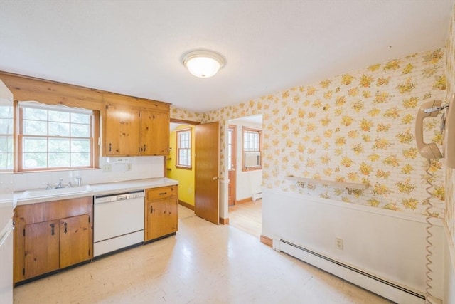 28 Marks Rd, Weymouth, MA 02189 - kitchen featuring baseboard heating, white dishwasher, wallpapered walls, a sink, and light countertops