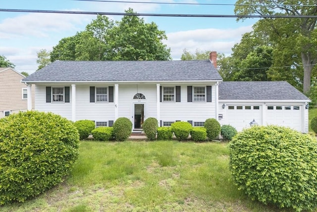 28 Marks Rd, Weymouth, MA 02189 - raised ranch featuring a garage, a front yard, a chimney, and a shingled roof